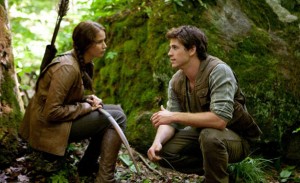 Lawrence, with Liam Hemsworth in "Hunger Games" - Lionsgate Lawrence, with Liam Hemsworth in "Hunger Games" - Lionsgate