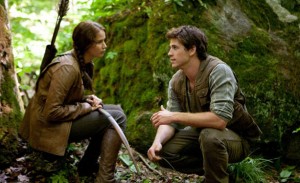 Lawrence, with Liam Hemsworth in "Hunger Games" - Lionsgate