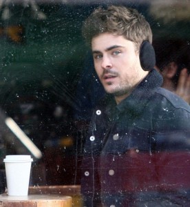 Zac Efron keeps warm on the cold set of "Are We Officially Dating?" in New York - photo: Pacific Coast News