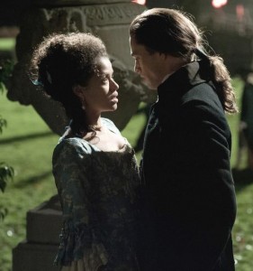 Gugu Mbatha-Raw (as Belle) is taken by John Davinier (actor, Sam Reid) in "Belle" (Fox Searchlight) 