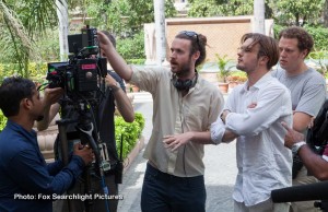 Director Mike Cahill , actor Michael Pitt and film crew discuss a shot on the set of I Origins