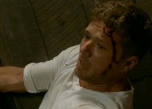 Ryan Phillippe is bloody in the face in this still from his directorial debut CATCH HELL