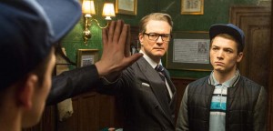actors Colin Firth and Taron Egerton face the big mirror in the new movie Kingsman The Secret Service
