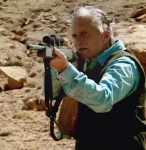 Michael Douglas hunts down a young desert guide in the new thriller Beyond The Reach (2015)