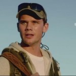 Jeremy Irvine (The Railway Man) falls prey to Michael Douglas' and his high-powered rifle in BEYOND THE REACH (2015)