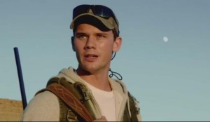 Jeremy Irvine (The Railway Man) falls prey to Michael Douglas and his high-powered rifle in BEYOND THE REACH (2015)