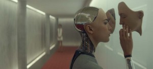 Swedish actress and dancer Alicia Vikander (A Royal Affair) pulls a young techie into an AI web, in Ex Machina (2015) - A24 Films