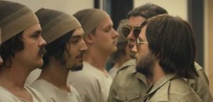 Actor Michael Angarano (R) intimidates Ezra Miller (L) - The Stanford Prison Experiment, IFC Films