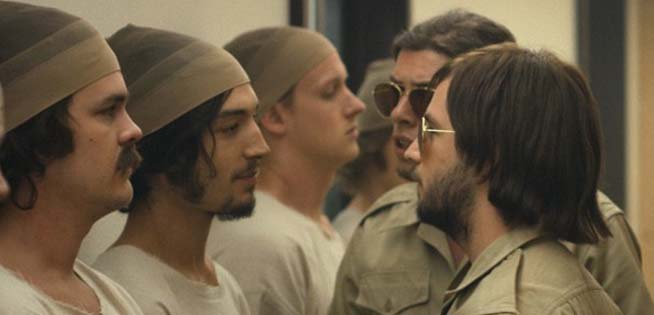 Actor Michael Angarano (R) intimidates Ezra Miller (L) - The Stanford Prison Experiment, IFC Films