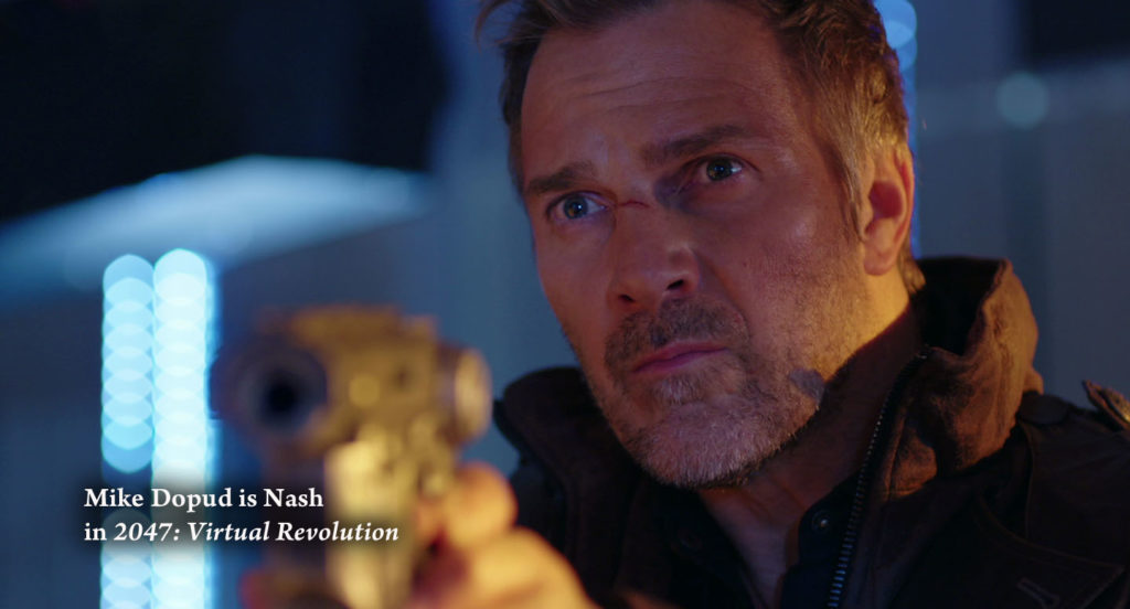 Sci-Fi fan favorite Mike Dopud chases terrorists threatening the system, in 2047: Virtual Revolution (movie). 