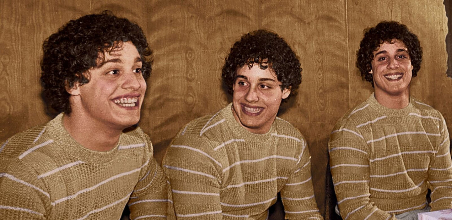 The twisted and amazing true story of the Shafran triplets is a must-see documentary film called Three Identical Strangers