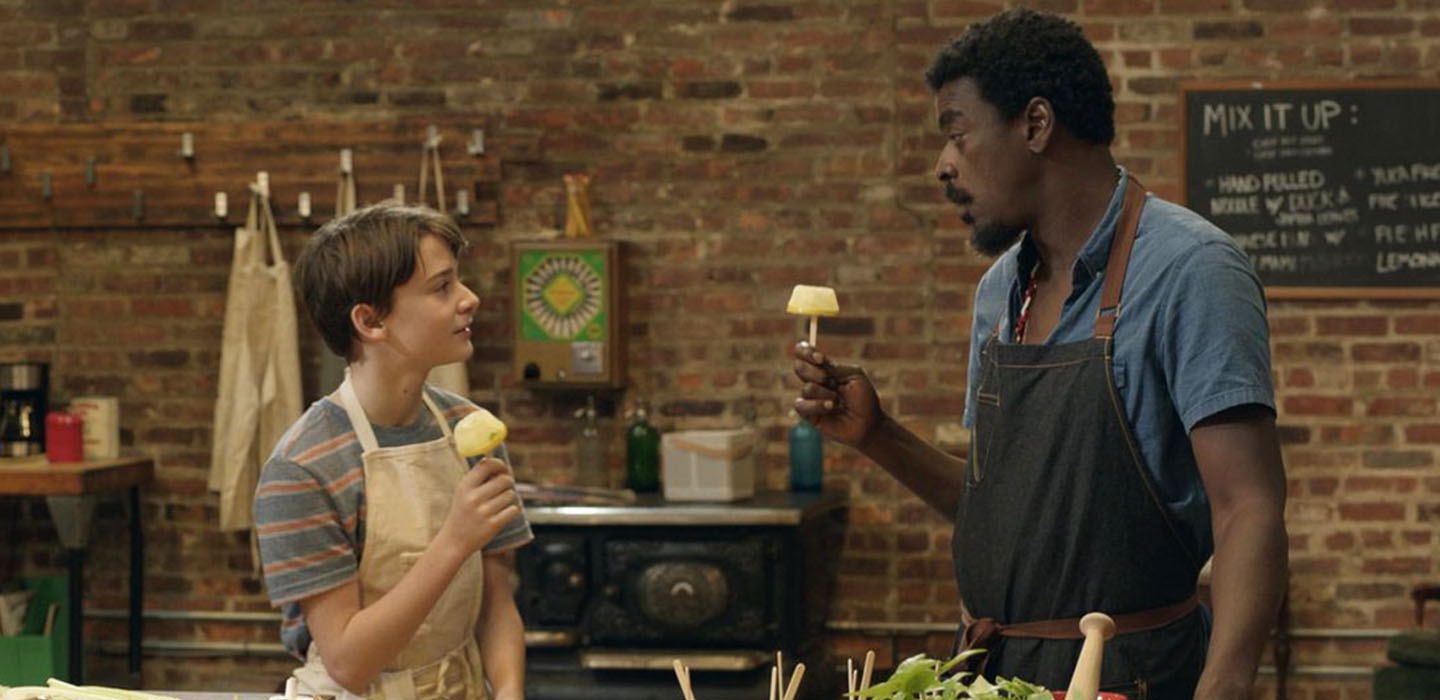 Noah Schnapp as Abe, and Seu Jorge as Chef Chico in ABE, 2019 film