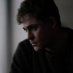 Dacre Montgomery as Jack in the gothic psychological drama Went Up the Hill (2025).